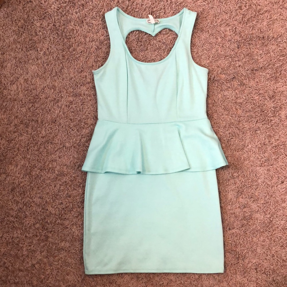 Mint green peplum dress, heart cutout on back